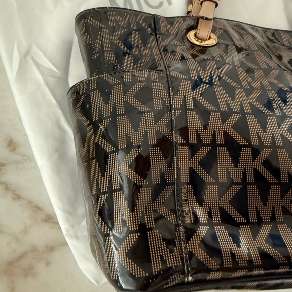 Michael Kors Black and Tan Signature Backpack - Picture 10 of 15